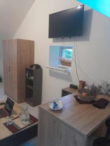 TV a/nebo společenská místnost v ubytování Appartement entouré de paysages magnifiques