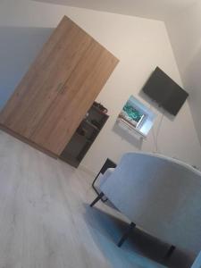 TV a/nebo společenská místnost v ubytování Appartement entouré de paysages magnifiques