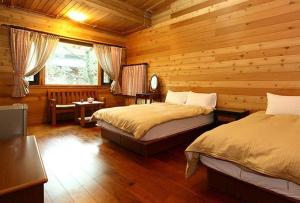Postel nebo postele na pokoji v ubytování Summer Trail B&B , Hall 2