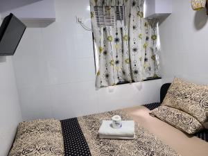 Ένα ή περισσότερα κρεβάτια σε δωμάτιο στο Days Hostel Block D