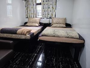 Ένα ή περισσότερα κρεβάτια σε δωμάτιο στο Days Hostel Block D