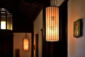Fotografie z fotogalerie ubytování Blossom Hill Inn Zhouzhuang Seasonland v destinaci Jinjiaba
