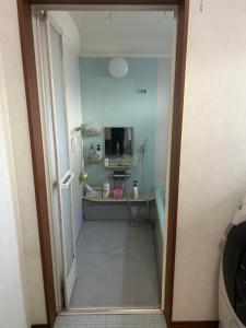 TV a/nebo společenská místnost v ubytování GuestHouse AIZU