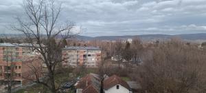 a view of a city with buildings and trees at WUGE Bihac in Bihać