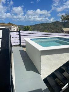 a swimming pool on top of a house at Breeze Manor in Scarborough