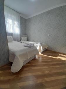Voodi või voodid majutusasutuse HOTEL LukaRabati toas