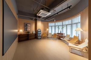 Posezení v ubytování Captain 5 Youth Hotel-Xianxia Road Branch