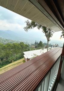 a view from the balcony of a house at De Pointé Resort & Resto in Campaka