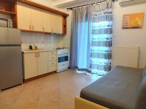 Kuchyňa alebo kuchynka v ubytovaní Eleonas Apartments