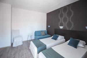 Postel nebo postele na pokoji v ubytování Guest House Taligarov