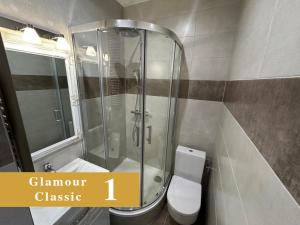 Koupelna v ubytování EFIPA Glamour Apartments