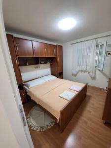 Postel nebo postele na pokoji v ubytování Krznar - Stari grad Pag + 29 fotografií