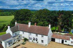 an aerial view of a large white house at Moat Cottage, Newby Hall, Ripon, North Yorkshire in Copt Hewick