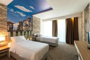 Кровать или кровати в номере Hotel Nar