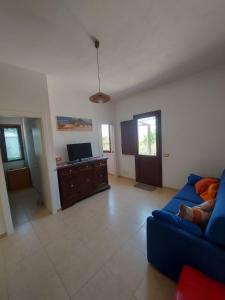 TV a/nebo společenská místnost v ubytování Casa Vacanze Dorotea