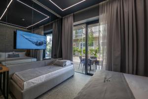 Gest Hotel客房内的一张或多张床位
