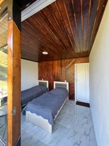 Postel nebo postele na pokoji v ubytování Ardoti Inn