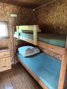 Postel nebo postele na pokoji v ubytování Torne Camping - Kano & Fiskecamp