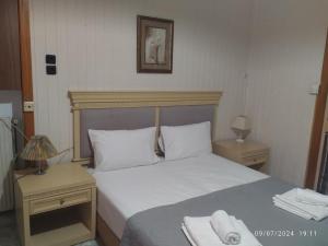 Posteľ alebo postele v izbe v ubytovaní Erini Room