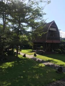 Κήπος έξω από το Ketewel Bed and Breakfast Jineng room