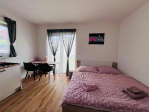 Postel nebo postele na pokoji v ubytování Apartmán Roda1 Malé Lipno