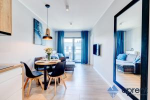 Ένα ή περισσότερα κρεβάτια σε δωμάτιο στο Apartament PASJA Gardenia Seaside - Aprent