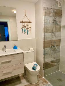 Kúpeľňa v ubytovaní Marina House Corralejo Center