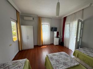 Postel nebo postele na pokoji v ubytování Twins Hotel + 37 fotografií