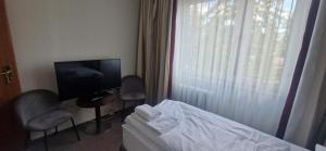 Billede fra billedgalleriet på BusinessHotel Am Peetzsee Grünheide i Schlangenluch