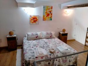 Postel nebo postele na pokoji v ubytování Vesna Loft in Luino