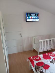 Postel nebo postele na pokoji v ubytování Apartman Lana