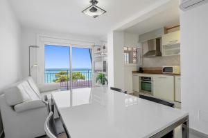 Kuchyň nebo kuchyňský kout v ubytování Hauzify I Apartament Cannes