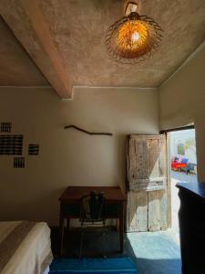 Riad Sahara Sunset Beach Douira Agadir客房内的一张或多张床位
