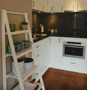 Η κουζίνα ή μικρή κουζίνα στο Modern 1 bed-walk Casino riverfront 5 mins to CBD