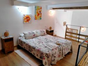 Postel nebo postele na pokoji v ubytování Vesna Loft in Luino