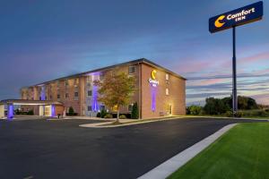 a hotel with a sign on the side of a building at Comfort Inn Hobart-Merrillville I-65 in Merrillville