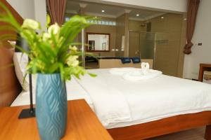 Letto o letti in una camera di Amor Resort Koh Rong