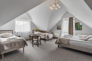 Posteľ alebo postele v izbe v ubytovaní Hotel Smile Pieniny + 37 fotografií