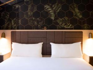 Postel nebo postele na pokoji v ubytování ibis Styles Strasbourg Nord Palais des Congrès + 37 fotografií