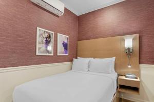 Postel nebo postele na pokoji v ubytování The Mayfair Hotel Times Square, Ascend Hotel Collection