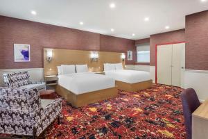 Postel nebo postele na pokoji v ubytování The Mayfair Hotel Times Square, Ascend Hotel Collection