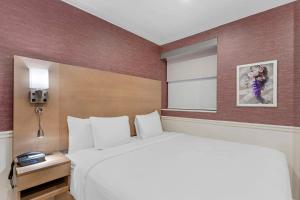 Postel nebo postele na pokoji v ubytování The Mayfair Hotel Times Square, Ascend Hotel Collection