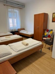 Postel nebo postele na pokoji v ubytování Guesthouse Pri Tonetu