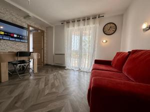 TV/trung tâm giải trí tại PLAGE porte Hermes Frejus avec Parking