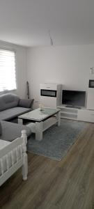 Posezení v ubytování DADA apartman
