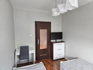 Posteľ alebo postele v izbe v ubytovaní BRZEŹNO nr 5