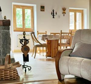 a living room with a couch and a table at Casa Rural Francisco Mayo in Isaba