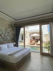 Fotografie z fotogalerie ubytování Evara Villas by Aayan v destinaci Tanah Lot