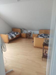 Postel nebo postele na pokoji v ubytování Unterkunft Mau
