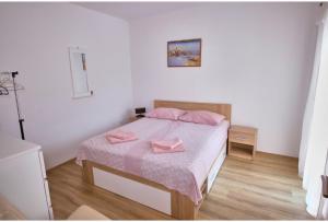 Postel nebo postele na pokoji v ubytování Roso